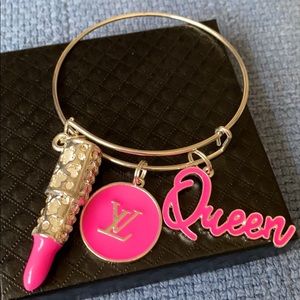 Silver plated bangle with charms